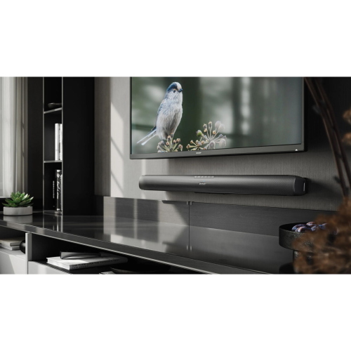 Sharp HT-SB100 soundbar nera per TV, ideale per migliorare l'audio domestico con design compatto e installazione semplice.